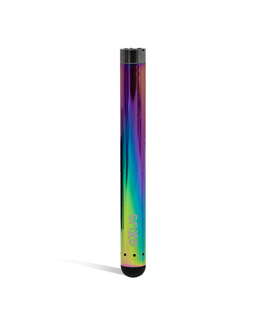 EXXUS Vape Slim 2.0 Cartridge Vaporizer featuring a sleek cylindrical design with iridescent rainbow finish, transitioning from purple to blue to green. The slim pen-style device displays black accents at top and bottom, with small EXXUS branding and air holes visible on its metallic surface.